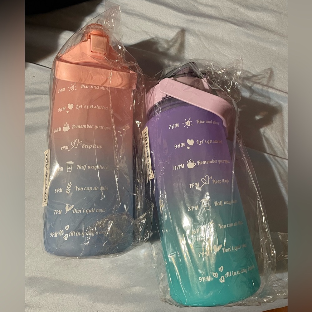 Brand new pair of 2 litter empty water bottles.